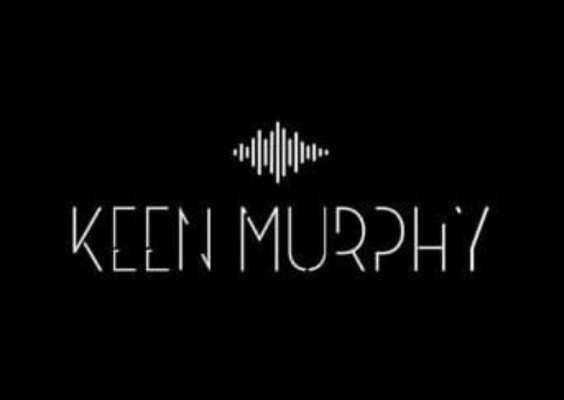 Logo-keen-murphy Logo singe avec couronne jaune sur fond noir